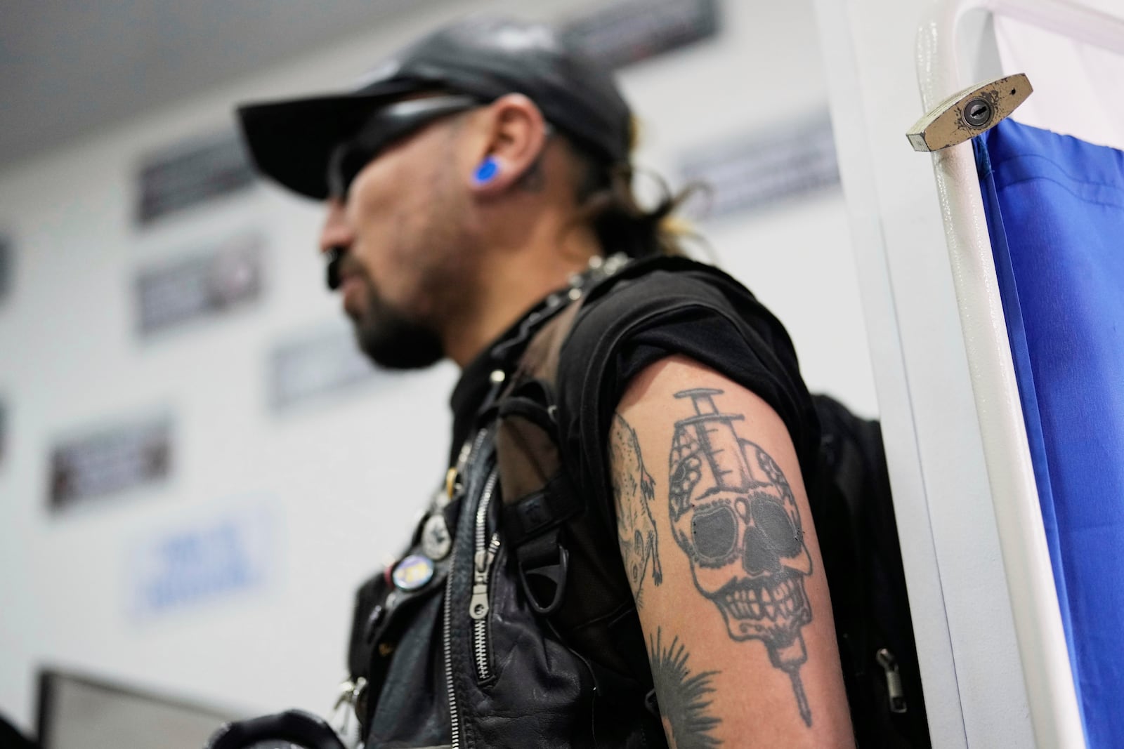 Christian Amaya, a drug user, stands at the Cambie supervised consumption room in Bogotá, Colombia, Sunday, April 27, 2025, where people who use substances receive injection kits or bring their own drugs while learning safe practices. (AP Photo/Fernando Vergara)