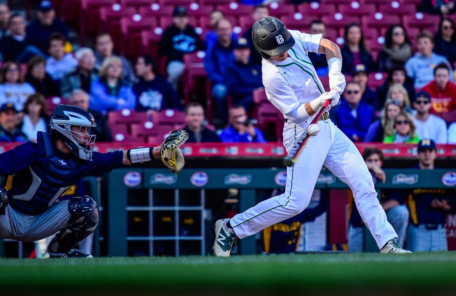 Badin’s A.J. Ernst makes contact with the ball during Friday’s game against Moeller at Great American Ball Park in Cincinnati. NICK GRAHAM/STAFF