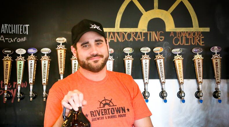Jason Roeper, founder of Cincinnati craft brewer Rivertown Brewing Company, plans to build and open a new brewery and taproom in Monroe. GREG LYNCH / STAFF