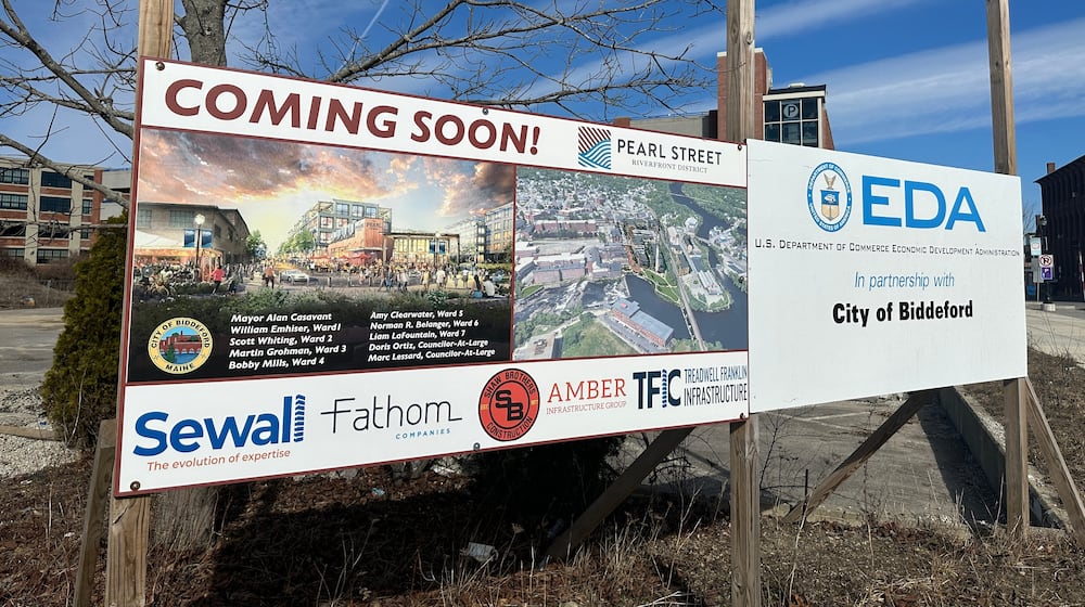 Schematics for an affordable housing project are posted Tuesday, March 17, 2026, in Biddeford, Maine. (AP Photo/Patrick Whittle)