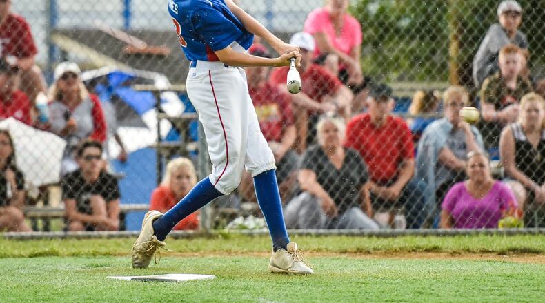 Hamilton-Fairfield’s Braylin Hailstones gets a piece of the ball during Tuesday night’s 10-0 loss to Hamilton West Side in the winners’ bracket final of the Little League District 9 tournament at West Side. NICK GRAHAM/STAFF