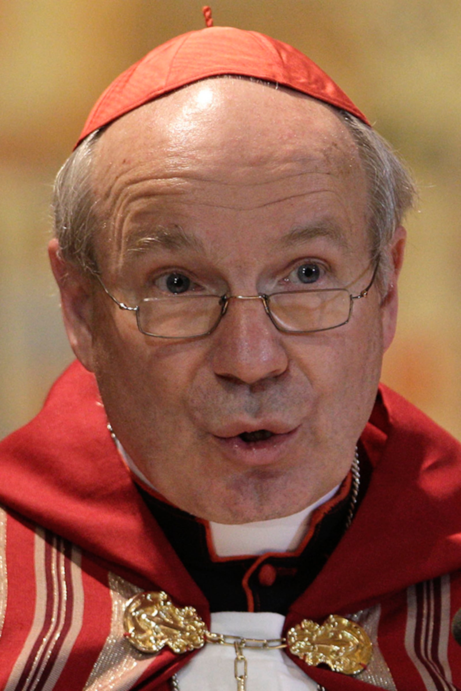 FILE - Cardinal Cristoph Schoenborn attends a celebration at St. Bartholomew Church at the Tiberine Island in Rome, March 4, 2013. (AP Photo/Riccardo De Luca, File)