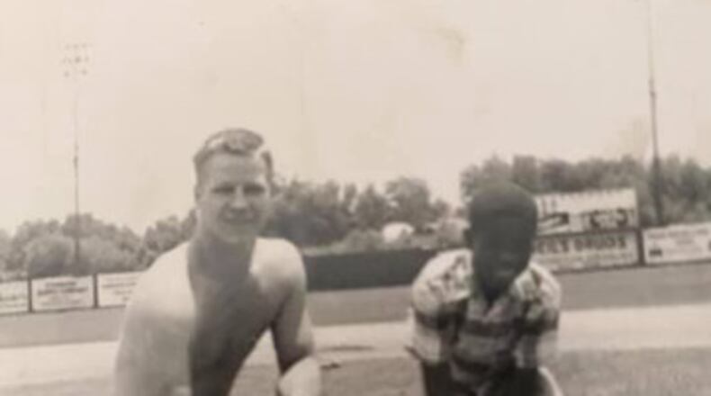 Hamilton's Ray Nichting, a standout hitter and outfield for the Fitzgerald Pioneers, a minor league baseball team, is shown with Joe Reliford, who at 12, became the youngest player to appear in a professional baseball game when he pinched hit for Nichting in 1952. SUBMITTED PHOTO