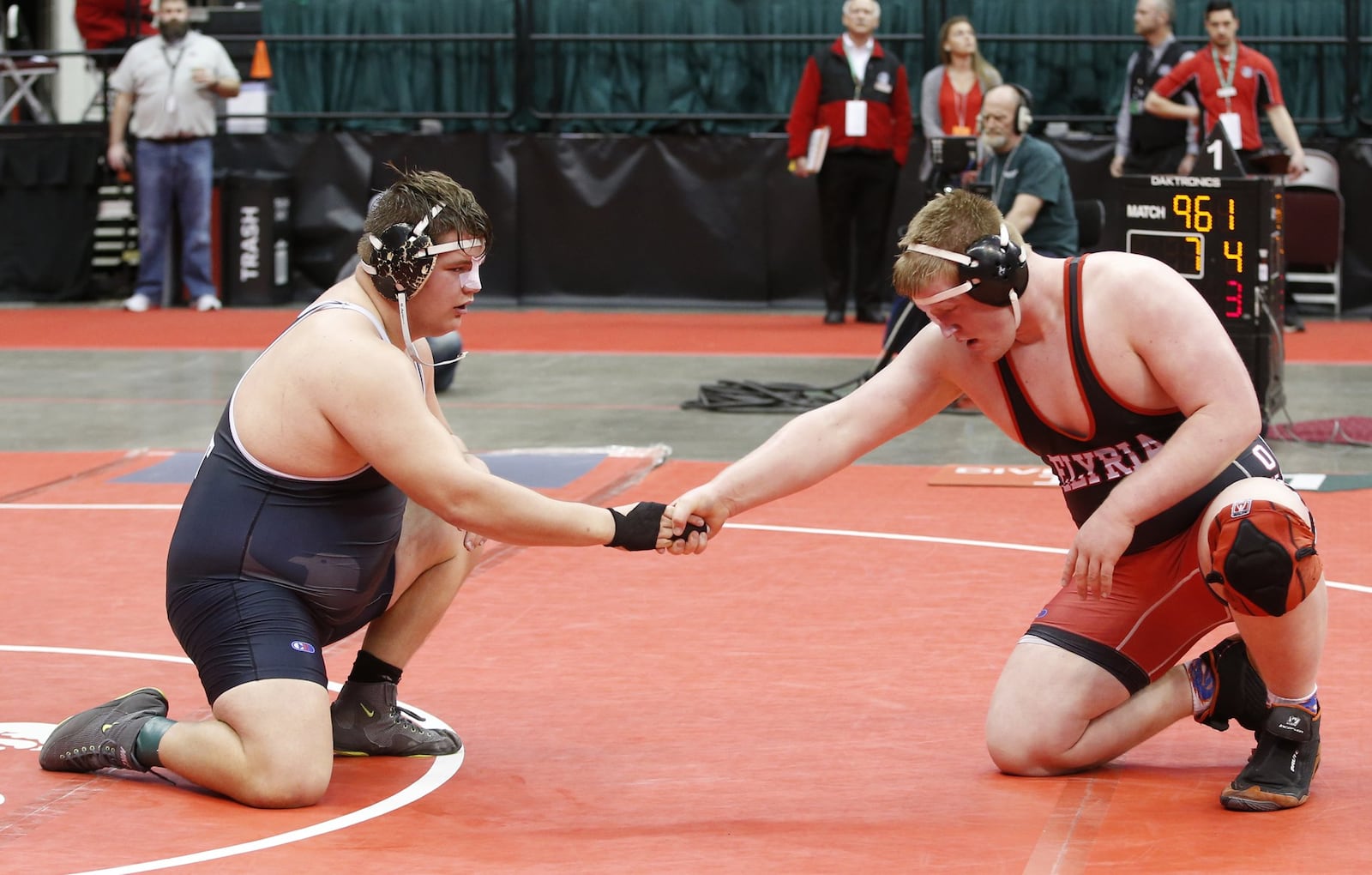 Lakota East’s Jon Spaulding (left) shakes hands with Elyria’s Kevin Vough at the end of their Division I state wrestling match at 285 pounds Friday at the Schottenstein Center in Columbus. BARBARA J. PERENIC/COLUMBUS DISPATCH