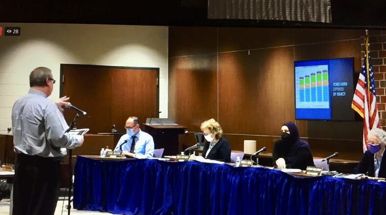 Randy Bertram, treasurer of Middletown Schools, told the city school board Monday evening his financial projections include no need for the district to ask residents for an operating tax hike for at least the next half-decade. Bertram presented to the board a five-year financial forecast as mandated by the state for all public school systems, twice a year. (Photo By Michael D. Clark\Journal-News)