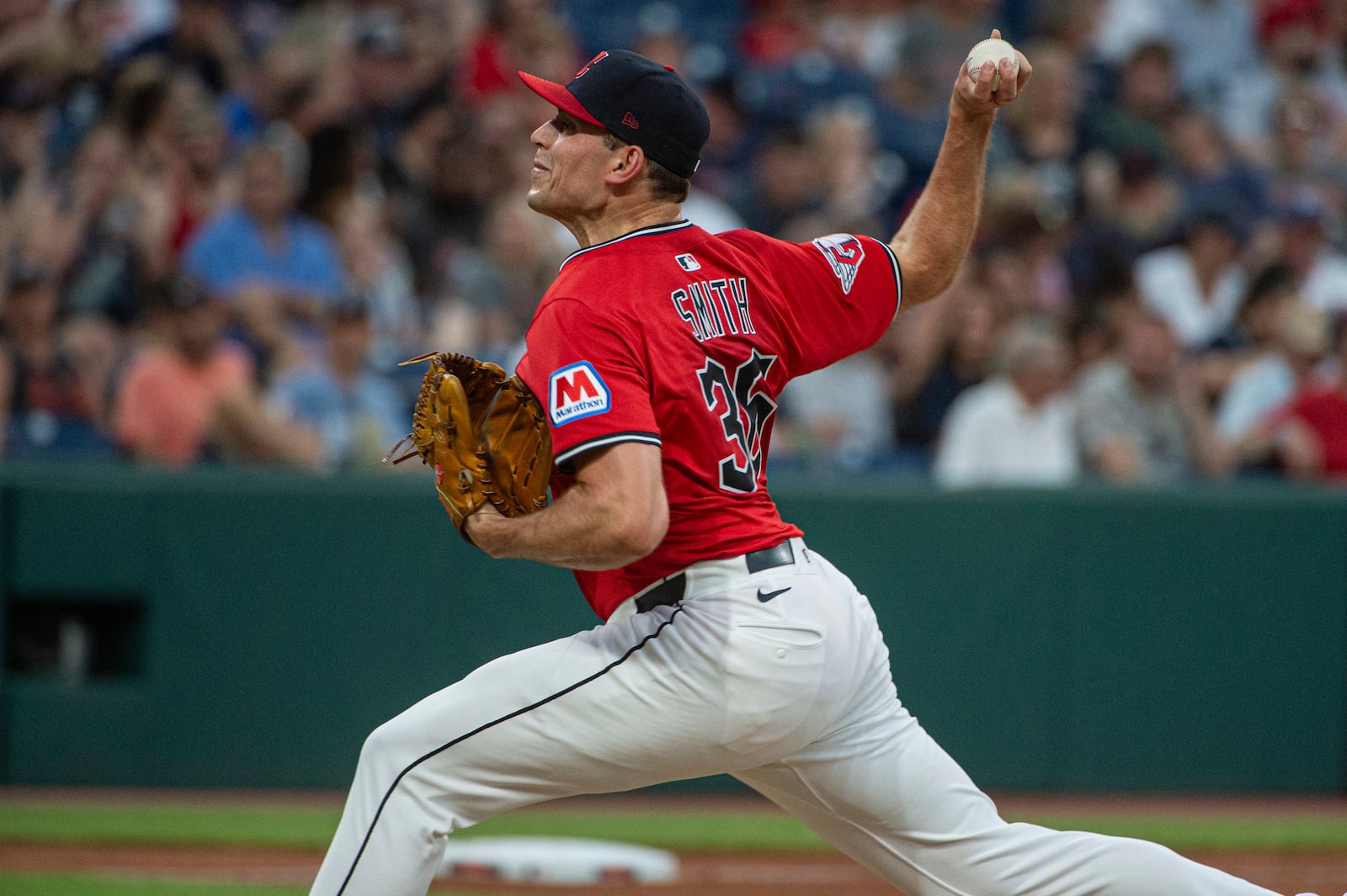 Cleveland Guardians relief pitcher Cade Smith delivers against the Detroit Tigers during the seventh inning of a baseball game, Saturday, July 5, 2025, in Cleveland. (AP Photo/Phil Long)