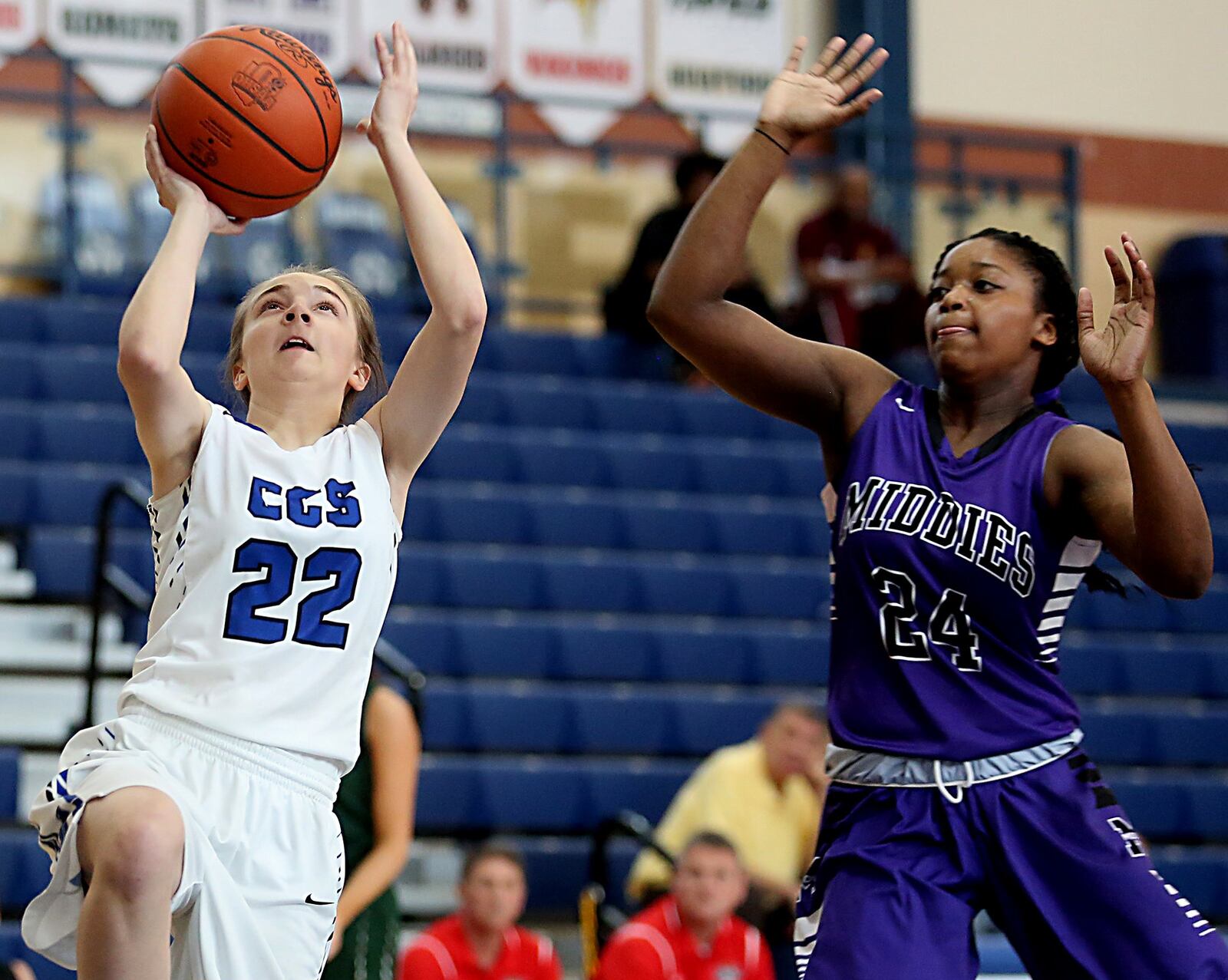 Cincinnati Christian’s Hannah Randall beats Middletown’s Olivia Wells-Daniels to the basket during Saturday’s inaugural All-Butler County All-Star girls basketball game at the Hamilton Athletic Center. CONTRIBUTED PHOTO BY E.L. HUBBARD