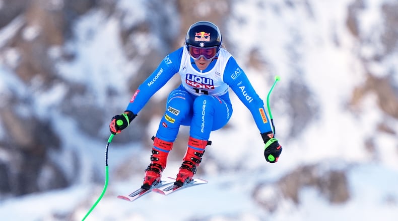 Italy's Sofia Goggia speeds down the course during an alpine ski, women's World Cup downhill training, in Val D'Isere, France, Friday, Dec.19, 2025. (AP Photo/Giovanni Auletta)