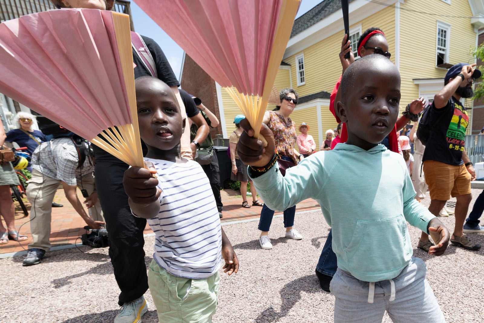Levis Martin, left, and his brother Daniel dance during a Juneteenth celebration at the African Burying Ground Memorial Park Thursday, June 19, 2025, in Portsmouth, N.H. (AP Photo/Michael Dwyer)
