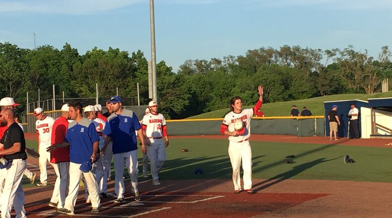 Madison senior Reid Davis waves toward the stands Thursday night after the Mohawks lost to Madeira 5-1 in a Division III regional semifinal at the Athletes in Action complex in Xenia. RICK CASSANO/STAFF