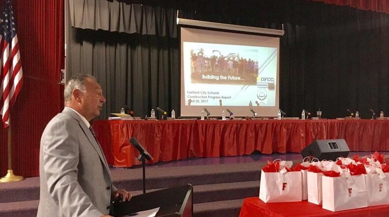 Tom Weiser, Fairfield City Schools’ director of business operations, gives an update on the district’s three new schools now under construction. Weiser told the school board during Thursday evening’s meeting that three schools’ construction were on schedule and within budget. MICHAEL D. CLARK/STAFF