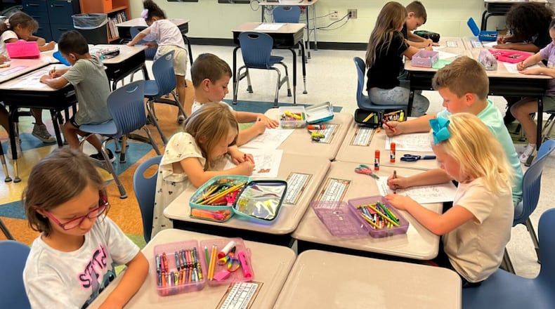 Fairfield North Elementary's performance on the 2023-2024 Ohio report card, which is compiled annually by the Ohio Department of Education and Workforce (ODEW), saw the Fairfield Twp. school named as one of the local winners of the “Momentum Award.” Other local winners include multiple buildings in Hamilton Schools (students pictured), Middletown and Lakota school systems. (File Photo/Journal-News)