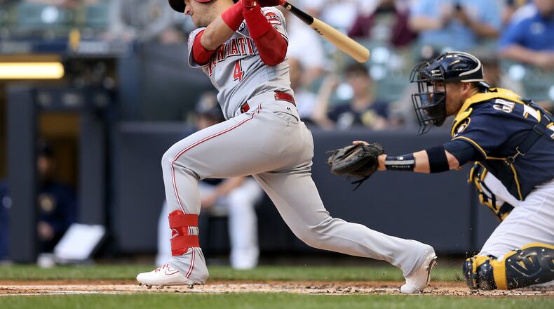 MILWAUKEE, WISCONSIN - JUNE 20:  Jose Iglesias #4 of the Cincinnati Reds hits a single in the first inning against the Milwaukee Brewers at Miller Park on June 20, 2019 in Milwaukee, Wisconsin. (Photo by Dylan Buell/Getty Images)