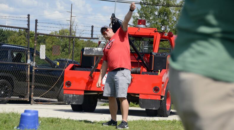 Ted McDaniel does a Babe Ruth imitation by “calling” a homerun shot during the Dougie & Ray’s inaugural Kicking Into Fall Kickball Tournament fundraiser on Aug. 24, 2019, at Swine City Brewing in Fairfield. MICHAEL D. PITMAN/STAFF