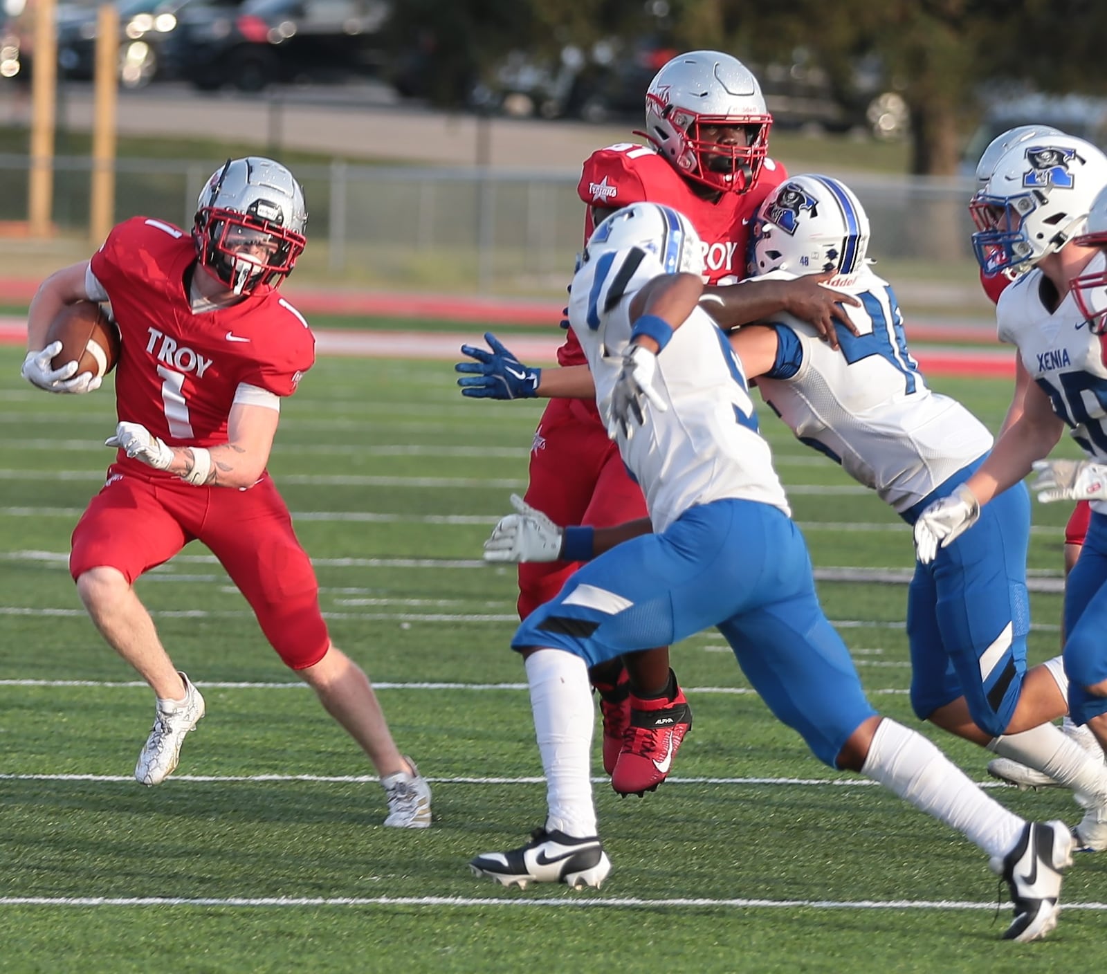 Troy High School senior Aidan Gorman runs the ball during their 24-14 victory over Xenia in Week 2 at Troy Memorial Stadium. STEVE BLACK / STAFF