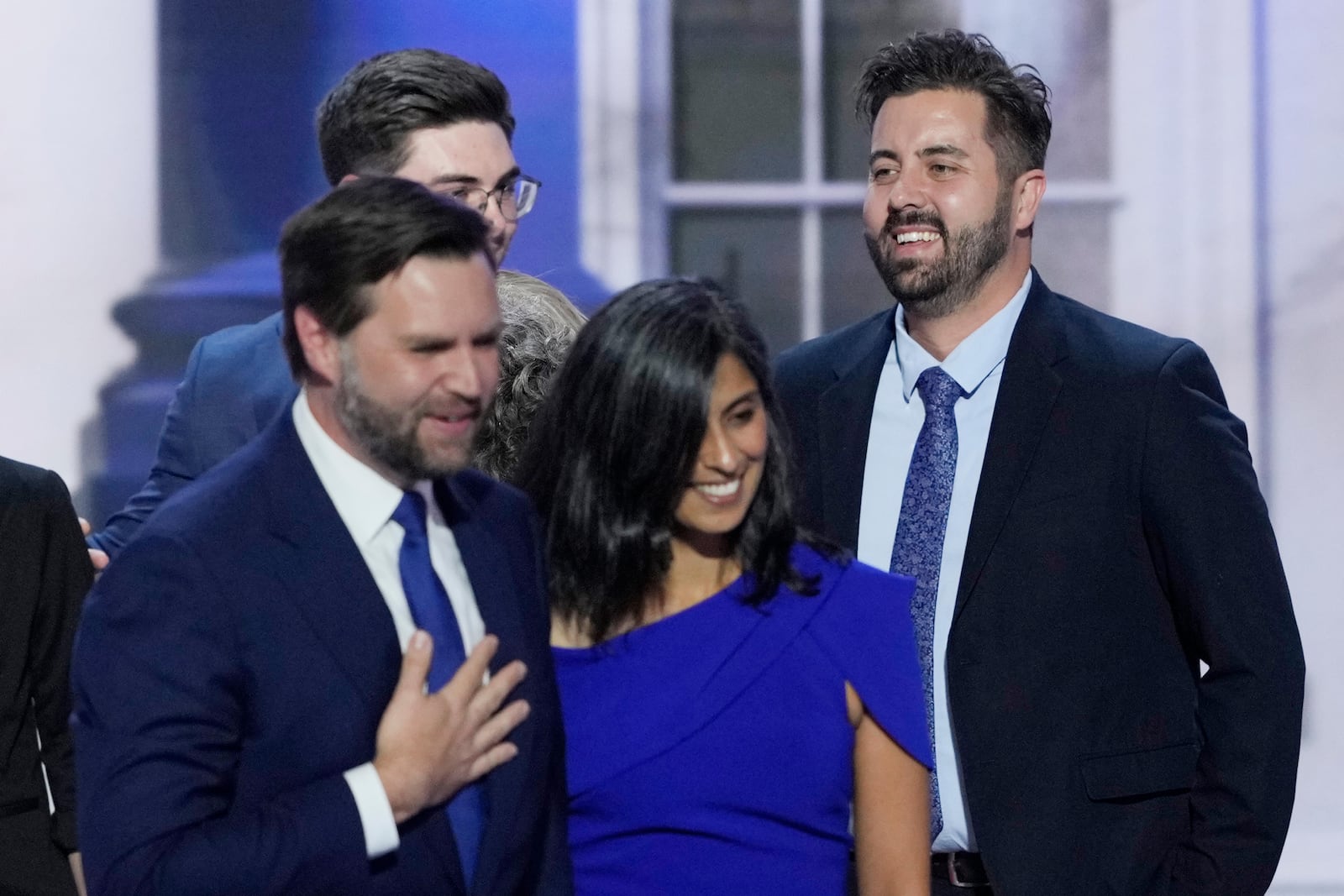 Cory Bowman, half-brother of Republican vice presidential candidate Sen. JD Vance, R-Ohio, from right, is pictured on stage with Usha Vance and JD Vance during the Republican National Convention, Wednesday, July 17, 2024, in Milwaukee. (AP Photo/J. Scott Applewhite)