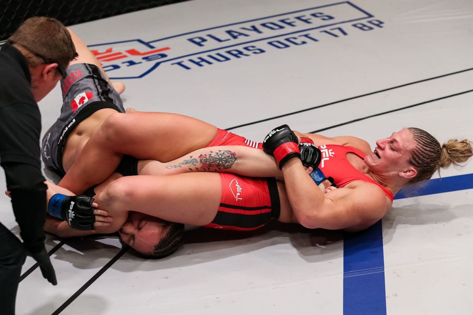 Kayla Harrison, from Middletown, uses her signature armbar move to defeat late-notice replacement Bobbi Jo Dalziel (5-2) in less than four minutes with a submission win Friday night in Las Vegas. PHOTO BY RYAN LOCO/PTL