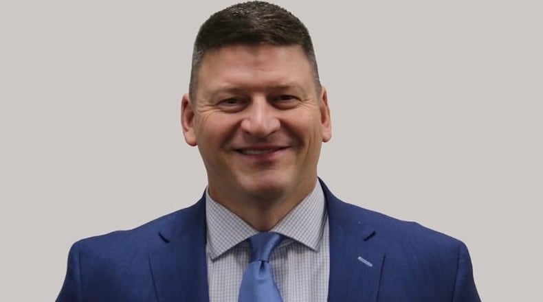 Mark Mueller, Monroe football coach