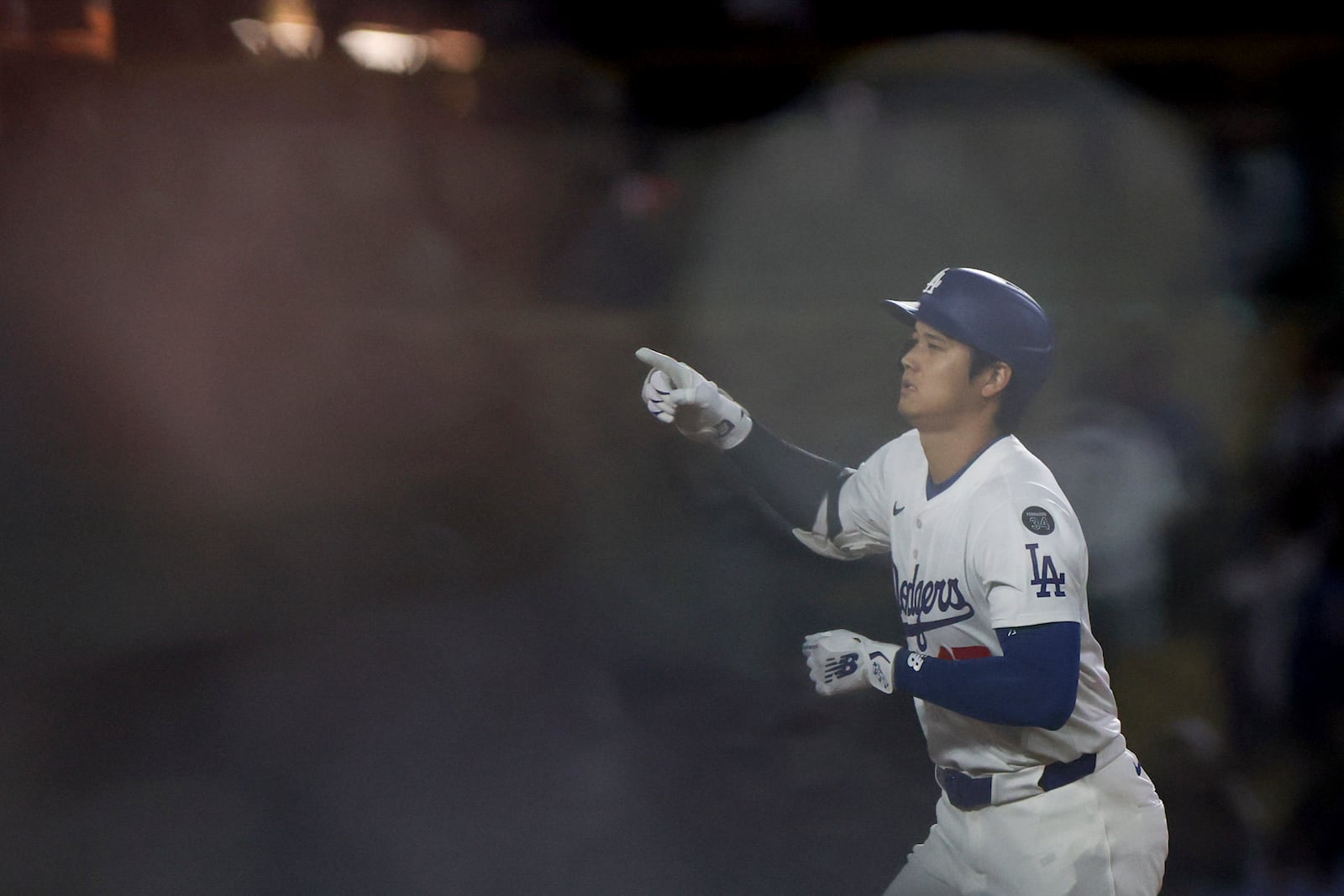 Los Angeles Dodgers designated hitter Shohei Ohtani runs the bases after hitting a home run during the ninth inning of a baseball game against the Minnesota Twins Tuesday, July 22, 2025, in Los Angeles. (AP Photo/Eric Thayer)