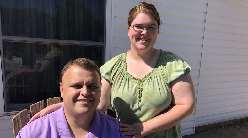 Nick and Kara Goodwin, of Fairfield, are holding a fundraiser Saturday in hopes of raising funds to offset the cost of adopting a baby. RICK McCRABB/STAFF