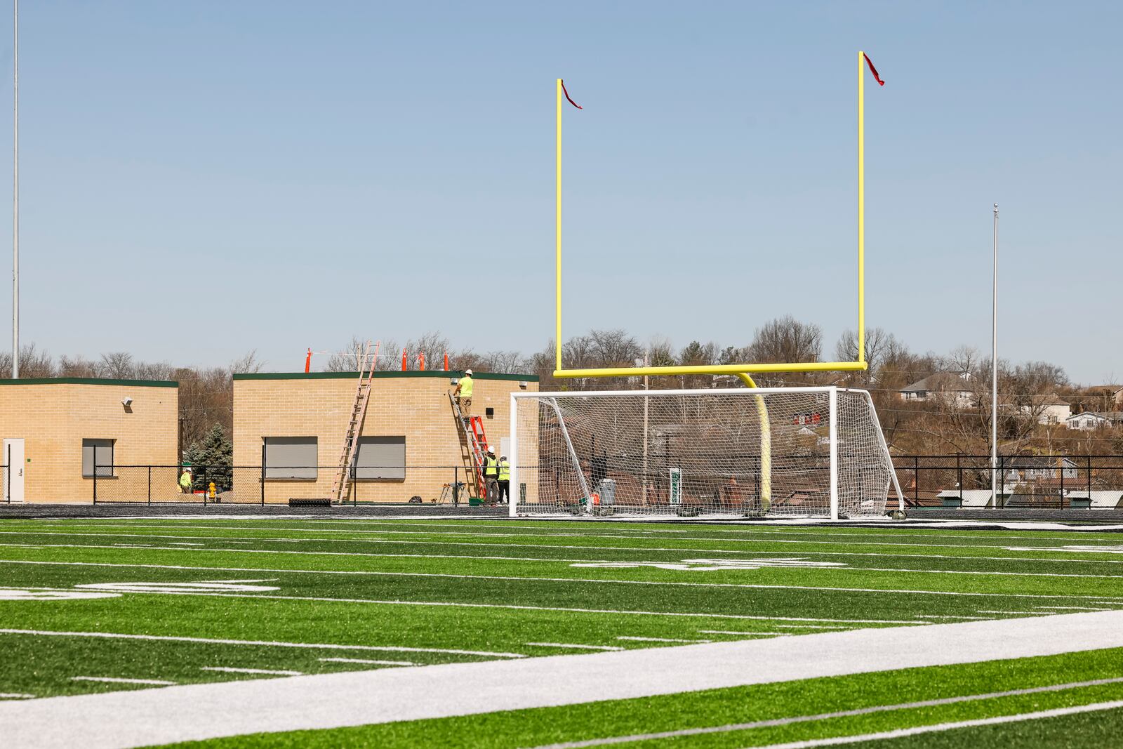 Construction continues Tuesday, March 18, 2025 on the Lanni Family Stadium at Matandy SportsPlex with concession stands, locker rooms and a turf practice field at Badin High School in Hamilton. The complex featuring Coach Terry Malone Field with an eight lane track around it is scheduled to be completed for fall sports seasons. NICK GRAHAM/STAFF
