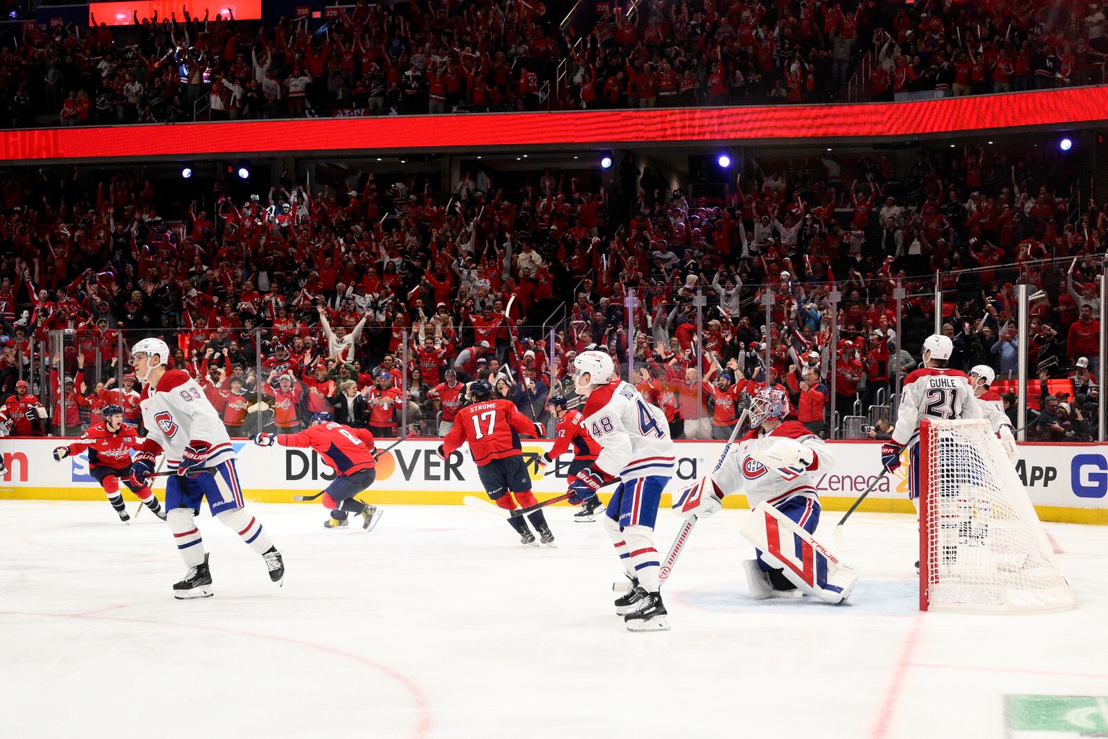 Washington Capitals left wing Alex Ovechkin (8) celebrates after his winning goal in overtime of Game 1 of a first-round NHL hockey playoff series against the Montreal Canadiens, Monday, April 21, 2025, in Washington. (AP Photo/Nick Wass)
