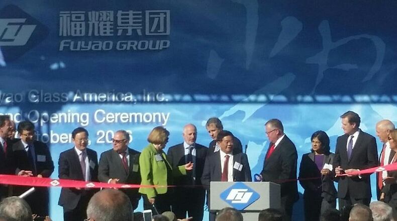 Fuyao Glass America, government and state officials cut a ribbon in celebration of the company’s grand opening in October 2016.
