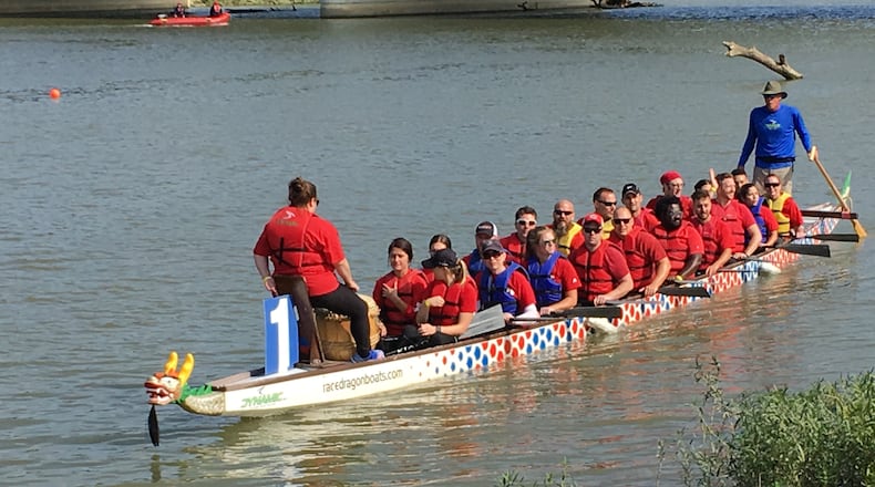 A dragon boat returning to the dock after a race. This was one of nine boat teams that competed in Saturday’s second annual Hamilton Dragon Boat Festival & Asian Cultural Festival. ED RICHTER/STAFF