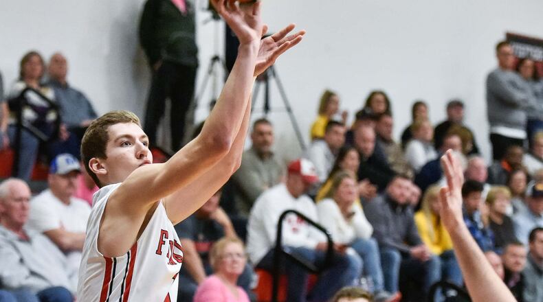 Franklin’s Jared Kinzer puts up a shot during a game against visiting Monroe on Jan. 26. NICK GRAHAM/STAFF