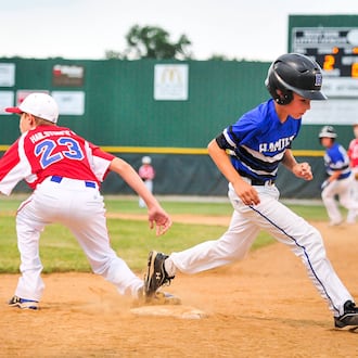 In this 2020 file photo, Hamilton West Side Little League plays Hamilton Fairfield Little League in an Ohio District 9 Little League tournament game at West Side Little League field in Hamilton. NICK GRAHAM/STAFF