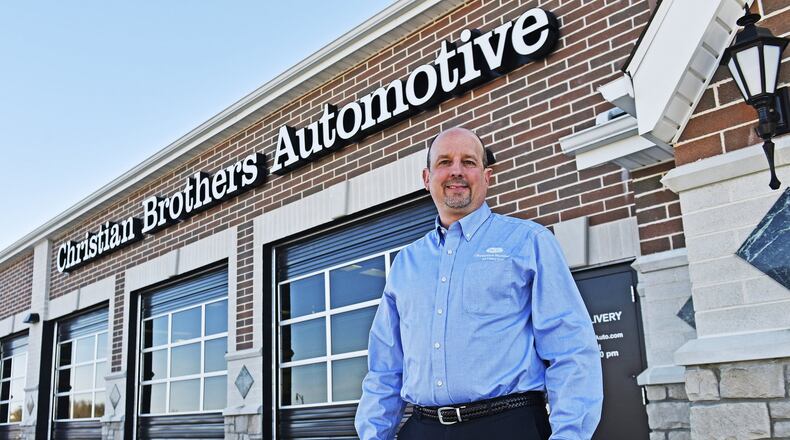 Doug Beachy, the new owner of West Chester Twp.’s Christian Brothers Automotive, is dedicated to doing charitable works via the business. NICK GRAHAM/STAFF