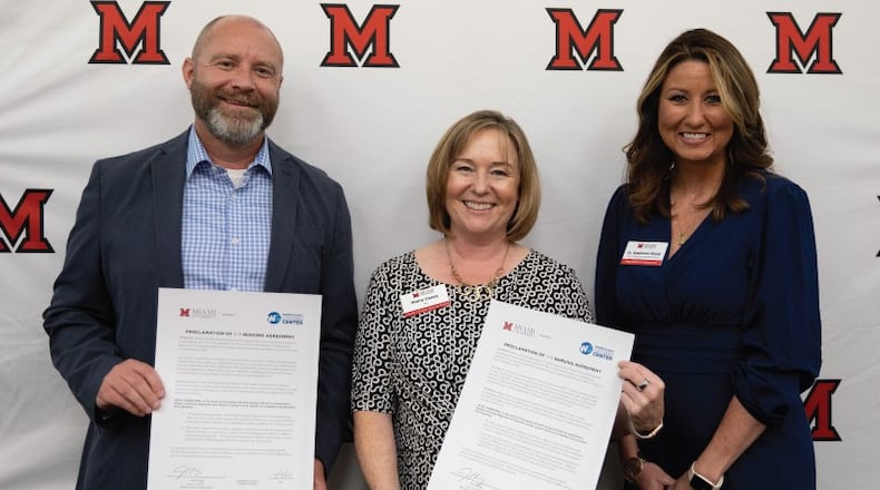 Butler County-based Miami University is reaching out to partner with Warren County’s career school system as it expands its high school nursing career training program. On Friday, Nov. 7, Warren County Career Center and Miami University Regionals Department of Nursing signed the Early Access 1+3 model proclamation. L to R: Joel King (Superintendent, Warren County Career Center), Moira Casey (Interim Dean, Miami Regionals CLAAS), and Stephanie Nicely (Chair, Miami University Department of Nursing). (Provided)