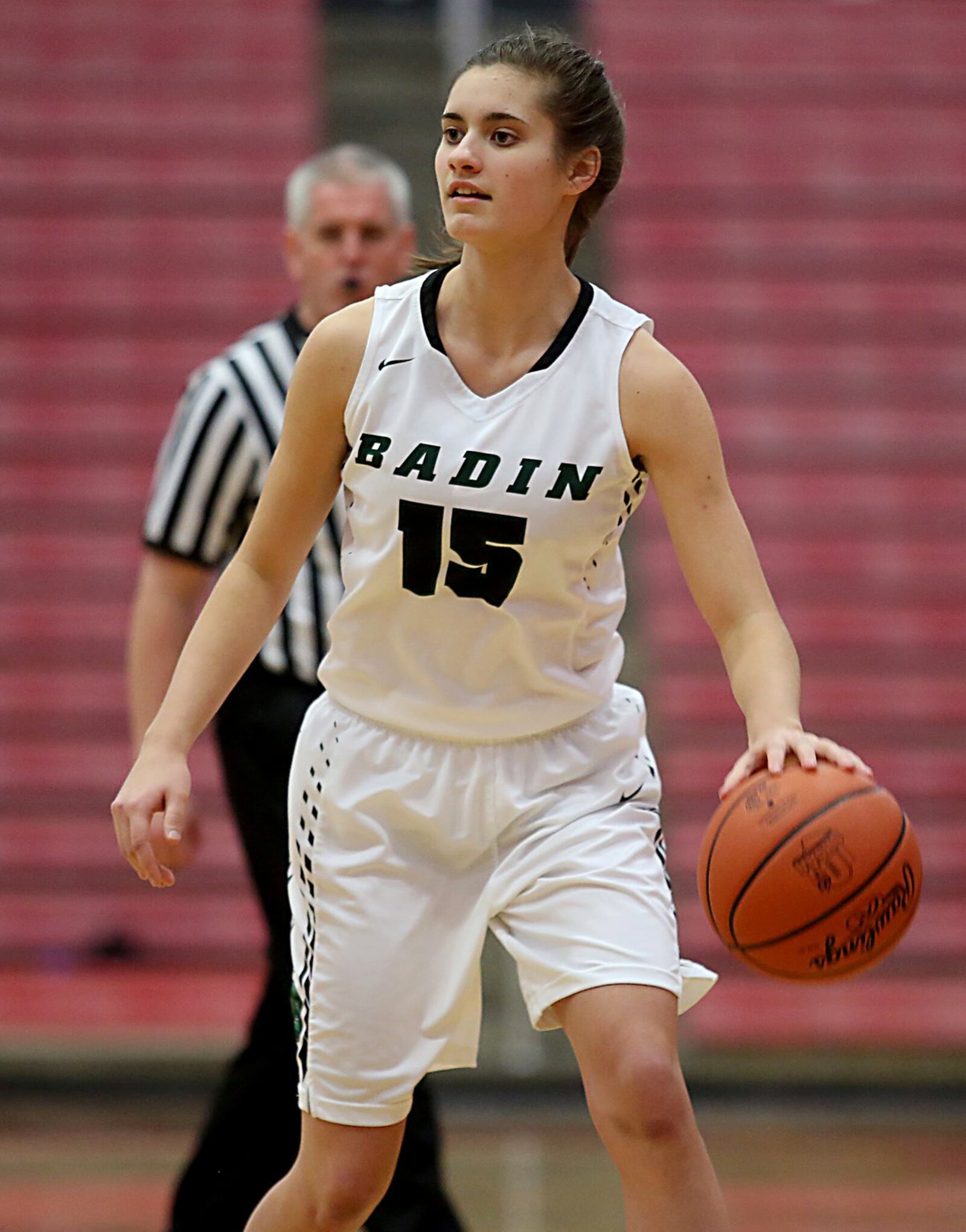 Badin guard Grace Larkin looks to put a play in motion Saturday afternoon during a Division III sectional final against Madeira at Fairfield Arena. CONTRIBUTED PHOTO BY E.L. HUBBARD