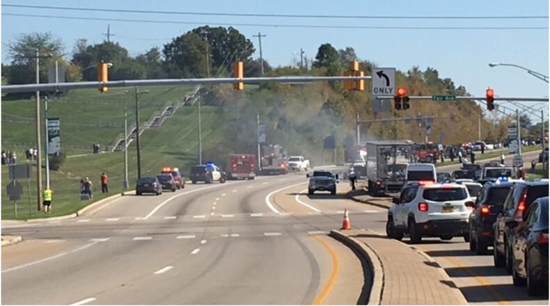 An SUV caught fire after an accident Oct. 20, 2017, at the intersection of Ohio 129 and Fair Avenue in Hamilton. The driver of that SUV died, despite bystanders attempting to help. LAUREN PACK/STAFF