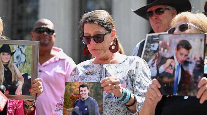 Mary Rodee holds a photo of her son Riley after the verdict in a landmark trial over whether social media platforms deliberately addict and harm children at Los Angeles Superior Court, Wednesday, March 25, 2026, in Los Angeles. (AP Photo/William Liang)