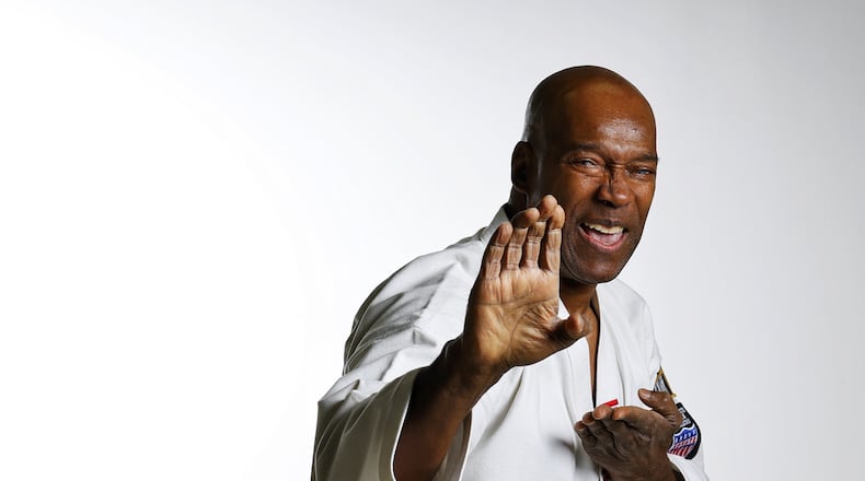 Lifelong Hamilton resident Bob “Moo Duk Kwan” Harris has been teaching karate since 1969, including more than 35 years of teaching at the Hamilton YMCA and his own studio. He has reached Supreme Nim Grand Master status in karate and and is a two-time national champion. Harris operates his photography business and Moo Duk Kwan Karate Temple at his South Second Street studio. NICK GRAHAM/STAFF