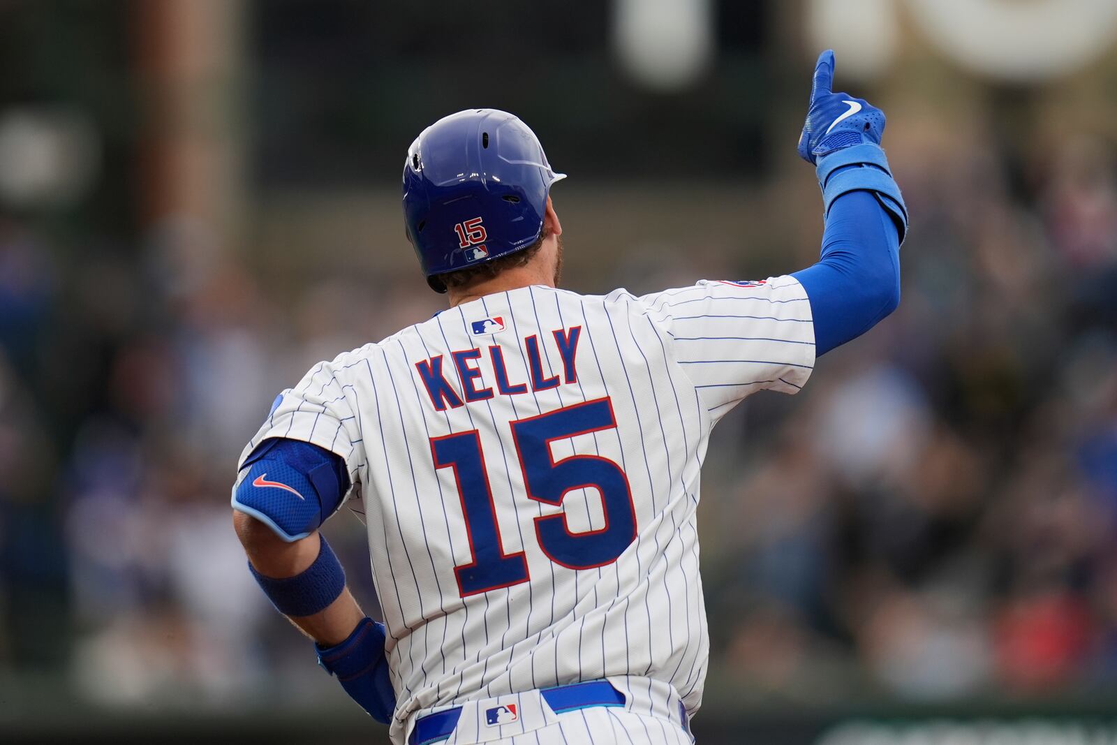 Chicago Cubs' Carson Kelly (15) runs the bases after hitting a two-run home run during the second inning of a baseball game against the Arizona Diamondbacks, Friday, April 18, 2025, in Chicago. (AP Photo/Erin Hooley)