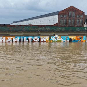 Heavy rain throughout the area caused flooding at the Great Miami River in Hamilton. Staff photos by Nick Graham.
