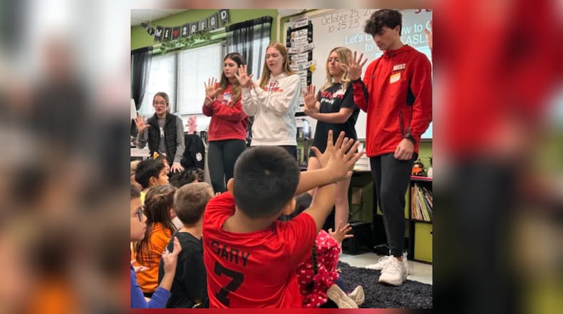 It’s a language that opens communication without saying a word and dozens of Lakota high school students are now increasingly fluent thanks to the district’s new learning program. Students at both Lakota East and Lakota West high schools participating in the district’s first American Sign Language (ASL) instructional track are telling school officials that becoming adept in the hand signing to communicate with the hearing impaired has been enlightening and rewarding. Some of the Lakota teens recently visited St. Rita’s School for the Deaf (pictured) for classroom interaction and ASL immersion. CONTRIBUTED