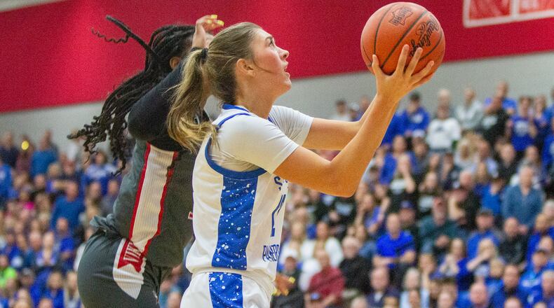 Springboro senior Bryn Martin gets to the basket for two of her 18 points during the Panthers' comeback in their state semifinal loss to Cincinnati Princeton on Sunday at Fairfield High School. Jeff Gilbert/CONTRIBUTED