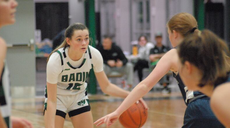 Badin's Gracie Cosgrove (15) looks for a passing lane against St. Ursula earlier this season. Chris Vogt/CONTRIBUTED