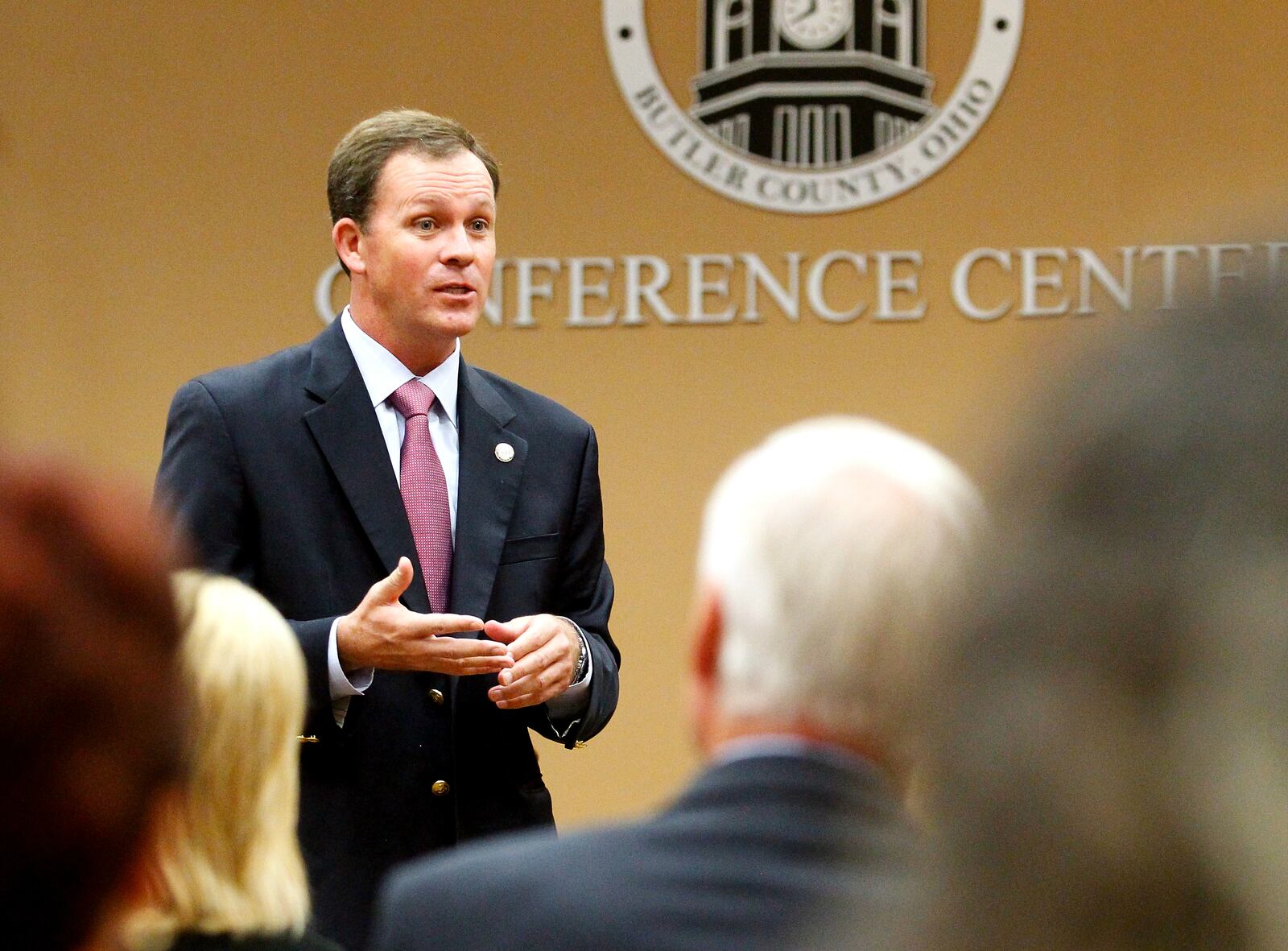 Butler County Auditor Roger Reynolds cut checks in 2014 totaling nearly $2 million to more than four dozen officials representing local public school districts, townships, cities, villages and county agencies. Last year’s announcement came on Sept. 2, 2014, during an event at the Government Services Center in Hamilton. NICK DAGGY/FILE