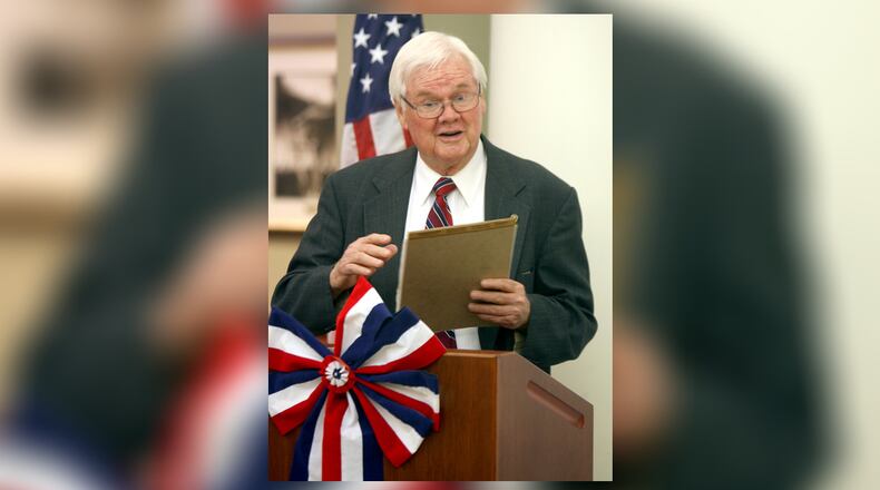 Former Butler County attorney and historian, Jim Irwin, describes the new timeline mural of all the Butler County Common Pleas Judges since Ohio became a state, unveiled in the rotunda of the Butler County Government Services Center, Wednesday, Sept. 7, 2011. Staff photo by Greg Lynch
