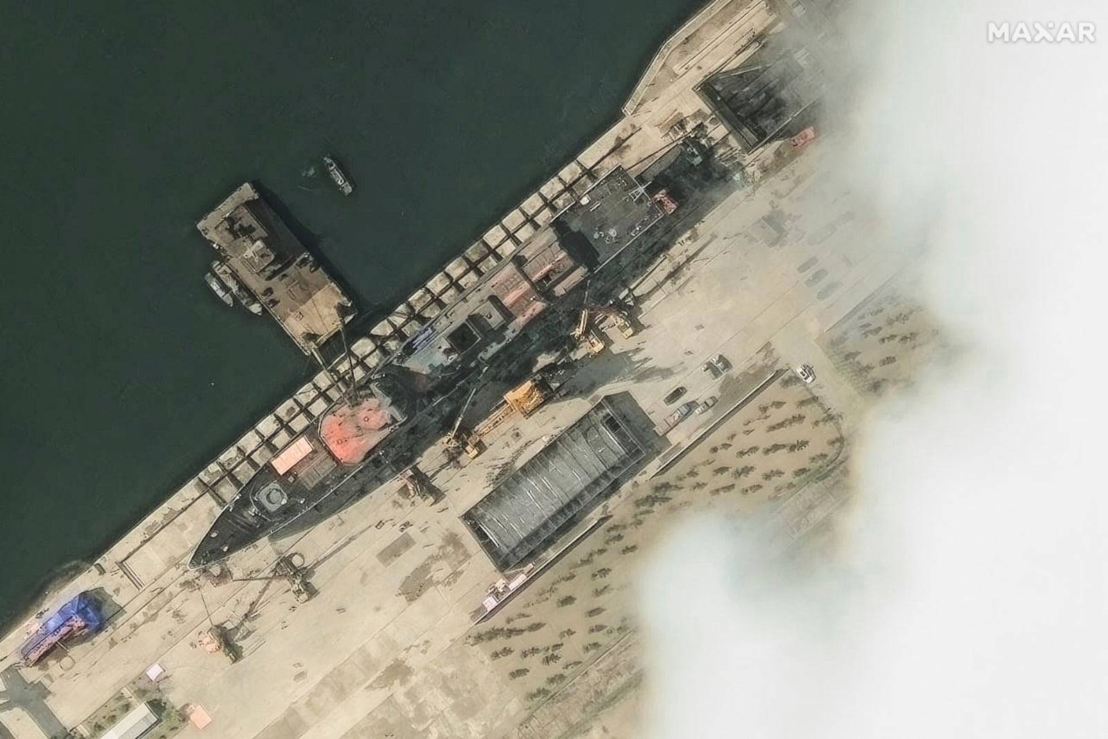 This satellite image provided by Maxar Technologies shows North Korea's new naval destroyer on May 18, 2025, in Chongjin, North Korea. (Maxar Technologies via AP)