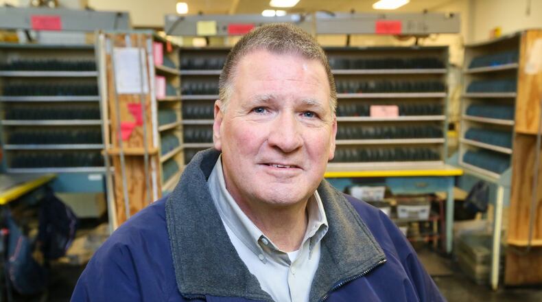 Hamilton mailman Ken Lipphardt, who last carried the mail on route 61, is retiring after 50 years of service. GREG LYNCH / STAFF
