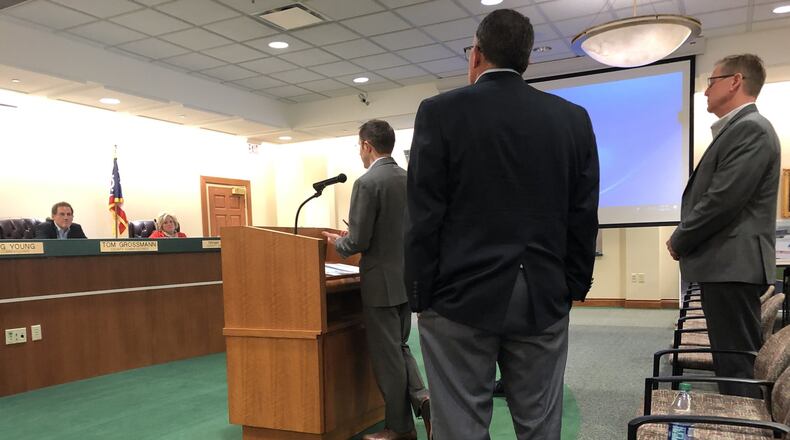 Executives from Century Link and Cincinnati Bell answer questions Tuesday from Warren County commissioners about why the 911 system malfunctioned. STAFF/LAWRENCE BUDD