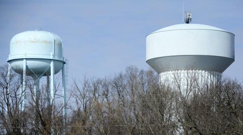 The 1.5 million-gallon water tank (right) on Seward Road will be cleaned, repaired and repainted this year and a submersible mixer will be installed. City Council is expected to award contracts on Monday. MICHAEL D. PITMAN/STAFF