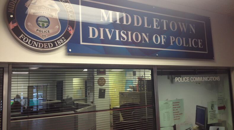 New signage in the lobby of the Middletown Police Department helps direct visitors. RICK MCCRABB/STAFF