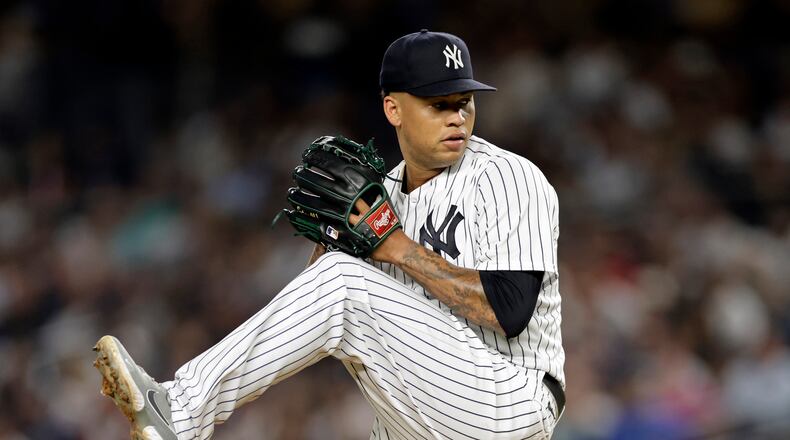 New York Yankees pitcher Frankie Montas winds up during the third inning of the team's baseball game against the Tampa Bay Rays on Friday, Sept. 9, 2022, in New York. (AP Photo/Adam Hunger)