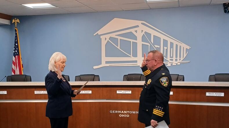 Germantown City Manager Judy Gilleland swears in Matt Burns as the city's new police chief Monday, April 22, 2024. CONTRIBUTED